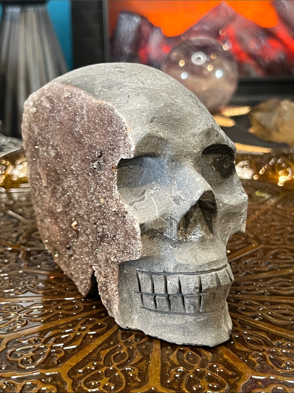Garnet skull on matrix